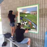 Green Venture Summer Students adding the finishing touches to the Veevers Park Mural